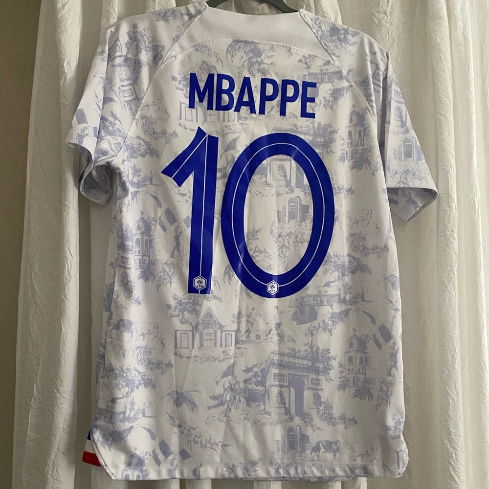 Mbappe shirt.